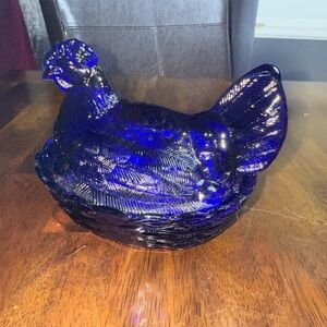 Cobalt blue hen on nest